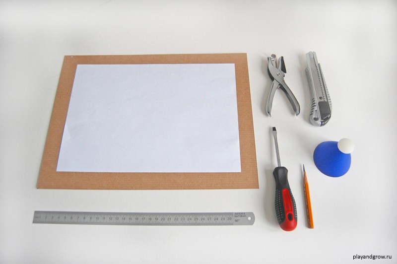 лист картону, розміром 260 × 350 мм;   аркуш паперу формату А4;   лінійка;   канцелярський ніж;   плоска викрутка;   олівець;   одинарний дирокол;   шаблон круглої форми
